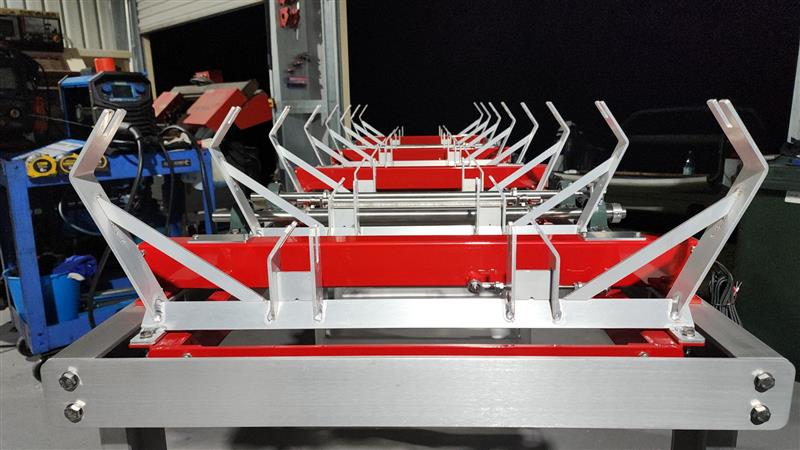 Completed conveyor frame and roller assembly